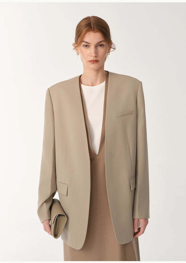 Giacca senza colletto con scollo a V in lana merino