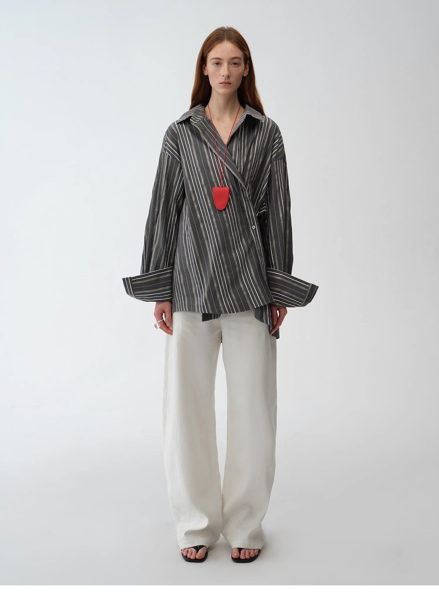 Camicia a righe asimmetrica