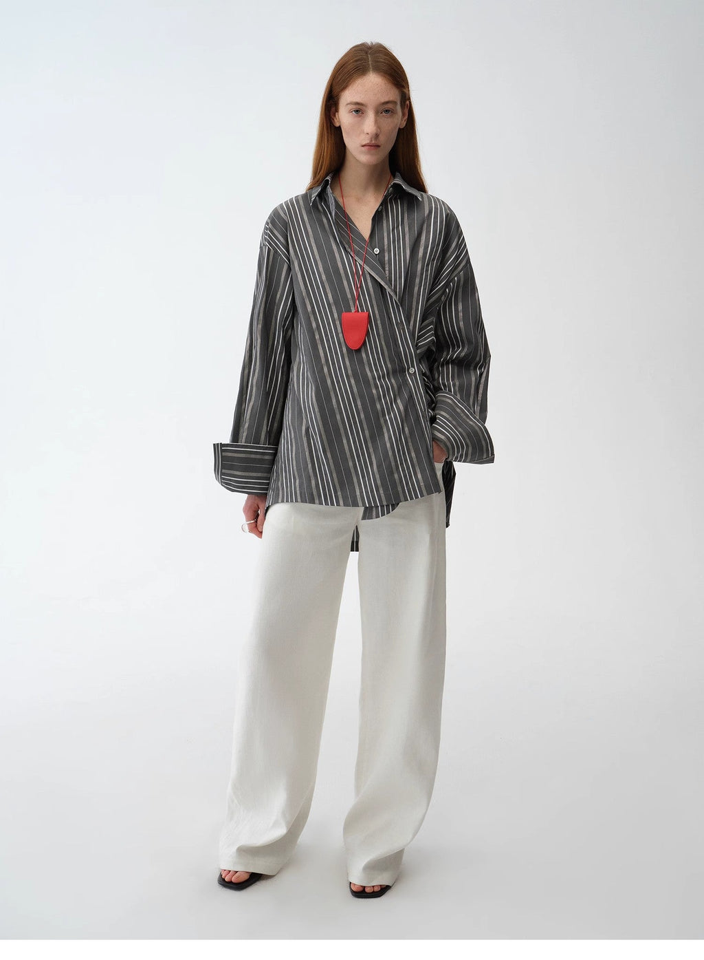 Camicia a righe asimmetrica