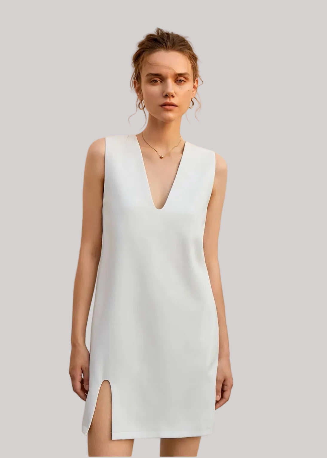 Abito senza maniche con spacco laterale